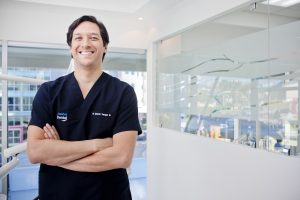 Picture of a smiling Costa Rica dentist.